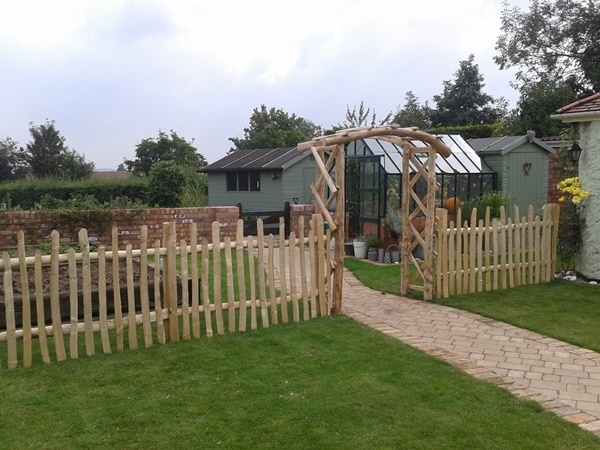 6 'standard' Cleft Chestnut rose arch and staggered height picket fencing 'standard' Cleft Chestnut rose arch and staggered height picket fencing