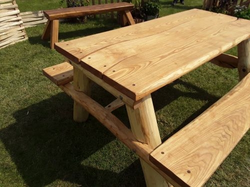 Sawn and round-wood picnic table Sawn and round-wood picnic table