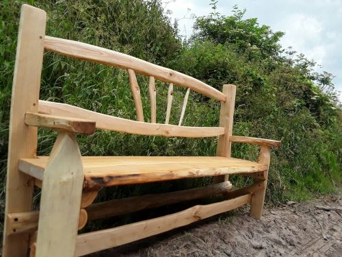 Sawn and cleft Chestnut fan back bench with arms Sawn and cleft Chestnut fan back rustic bench with arms