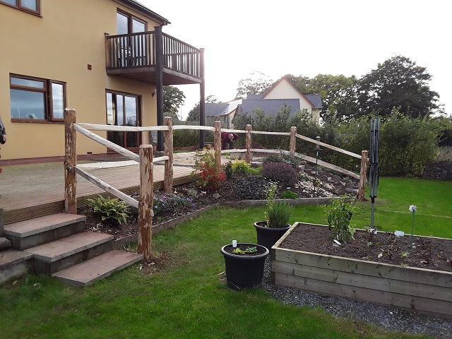 014 Post and Rail works well on slopes Rustic Cleft Chestnut fencing works well on slopes in Herefordshire
