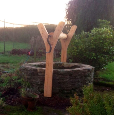 Chestnut well roller and support Chestnut well roller and support