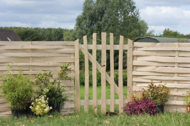 Lath panel run with gate Cleft Chestnut lath panel run with gate