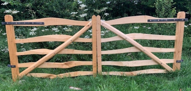 Mordiford gate with curvy rails and copper rivets Mordiford gate with curvy rails and copper rivets