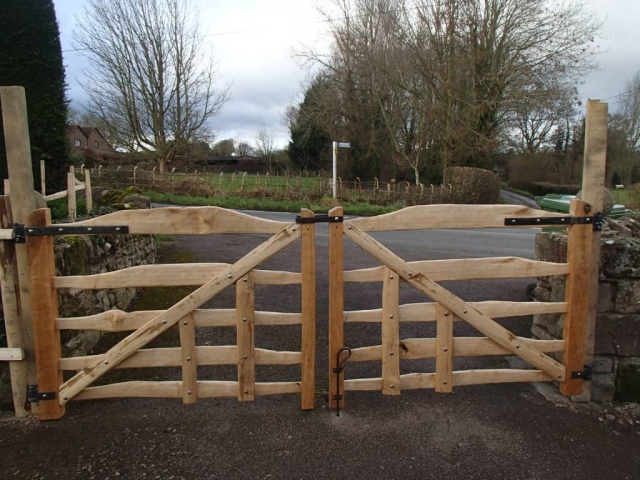 Bespoke sawn Oak and cleft Chestnut gates with blacksmith forged furniture Bespoke sawn Oak and cleft Chestnut gates with blacksmith forged furniture
