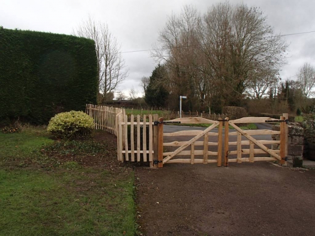 Bespoke sawn Oak and cleft Chestnut gates with blacksmith forged furniture Bespoke sawn Oak and cleft Chestnut rustic gates with blacksmith forged furniture