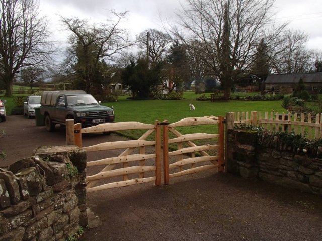 Bespoke sawn Oak and cleft Chestnut gates with blacksmith forged furniture Bespoke sawn Oak and cleft Chestnut gates with blacksmith forged furniture
