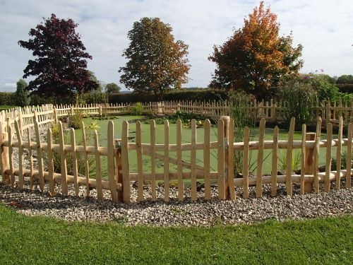 Cleft Chestnut wicket gate with picket fencing Rustic Cleft Chestnut wicket gate with picket fencing