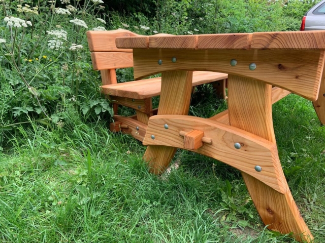 Trestle bench set detail Chestnut trestle table and bench with back