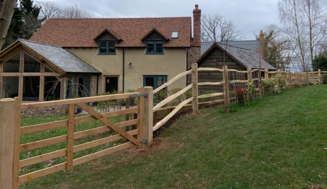 Sawn gate with post and rail fencing Sawn gate with post and rail fencing