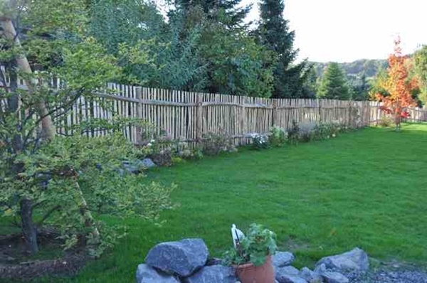Bespoke 'bark on' cleft Chestnut fence Bespoke 'bark on' cleft Chestnut fence