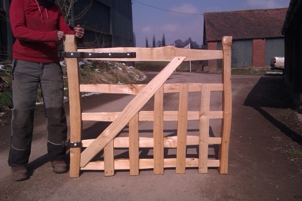 Cleft Chestnut gate with blacksmith forged furniture Cleft Chestnut gate with blacksmith forged furniture