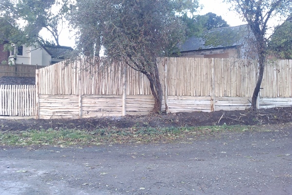 Cleft Chestnut close board fencing with gravel boards Cleft Chestnut close board fencing with gravel boards