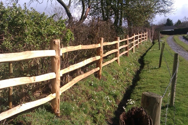 11 Cleft chestnut 3 rail post and rail with the posts mortised for the rails to fit through Cleft chestnut 3 rail post and rail with the posts mortised for the rails to fit through