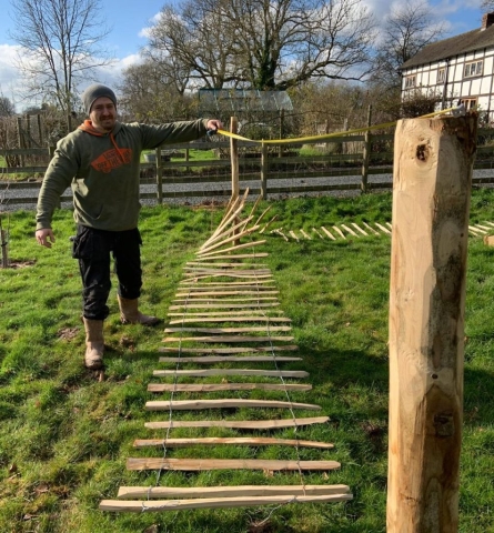 Joe installing some Chestnut paling Joe installing some Chestnut paling