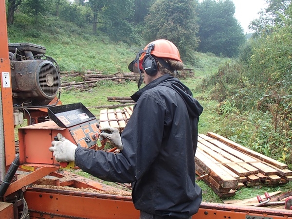 Cutting larch in a customers woodland with the woodmizer Cutting larch in a customers woodland with the woodmizer