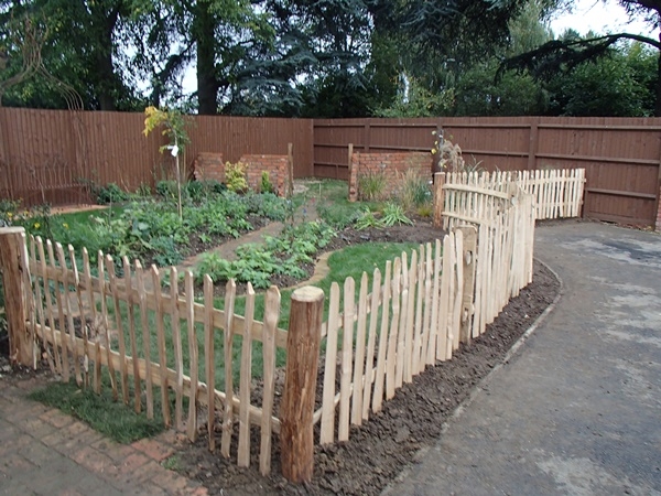 055 Picket fencing with a mortised frame Rustic cleft Chestnut Picket fencing with a mortised frame