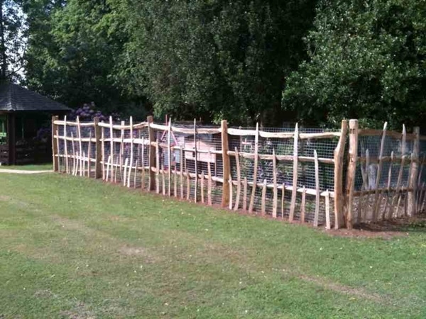 14 Traditional 'deer park' fencing Traditional deer park fencing using cleft Chestnut
