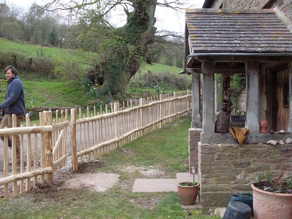002 Cleft Chestnut nail framed fencing with staggered height pickets Cleft Chestnut nail framed fencing with staggered height pickets