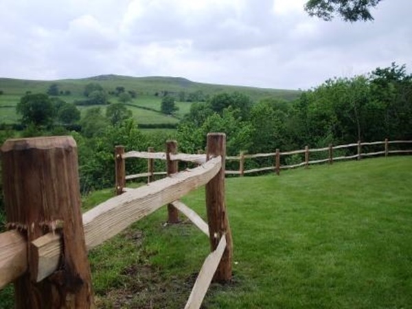 18 Estate grade cleft Chestnut mortised post and rail fencing, with two rails Estate grade, cleft Chestnut mortised post and rail fencing, with two rails